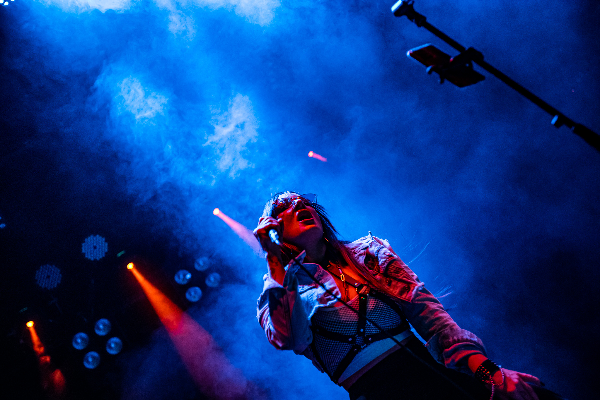 Atmospheric live moment. Tanita vibing in swirling blue smoke.