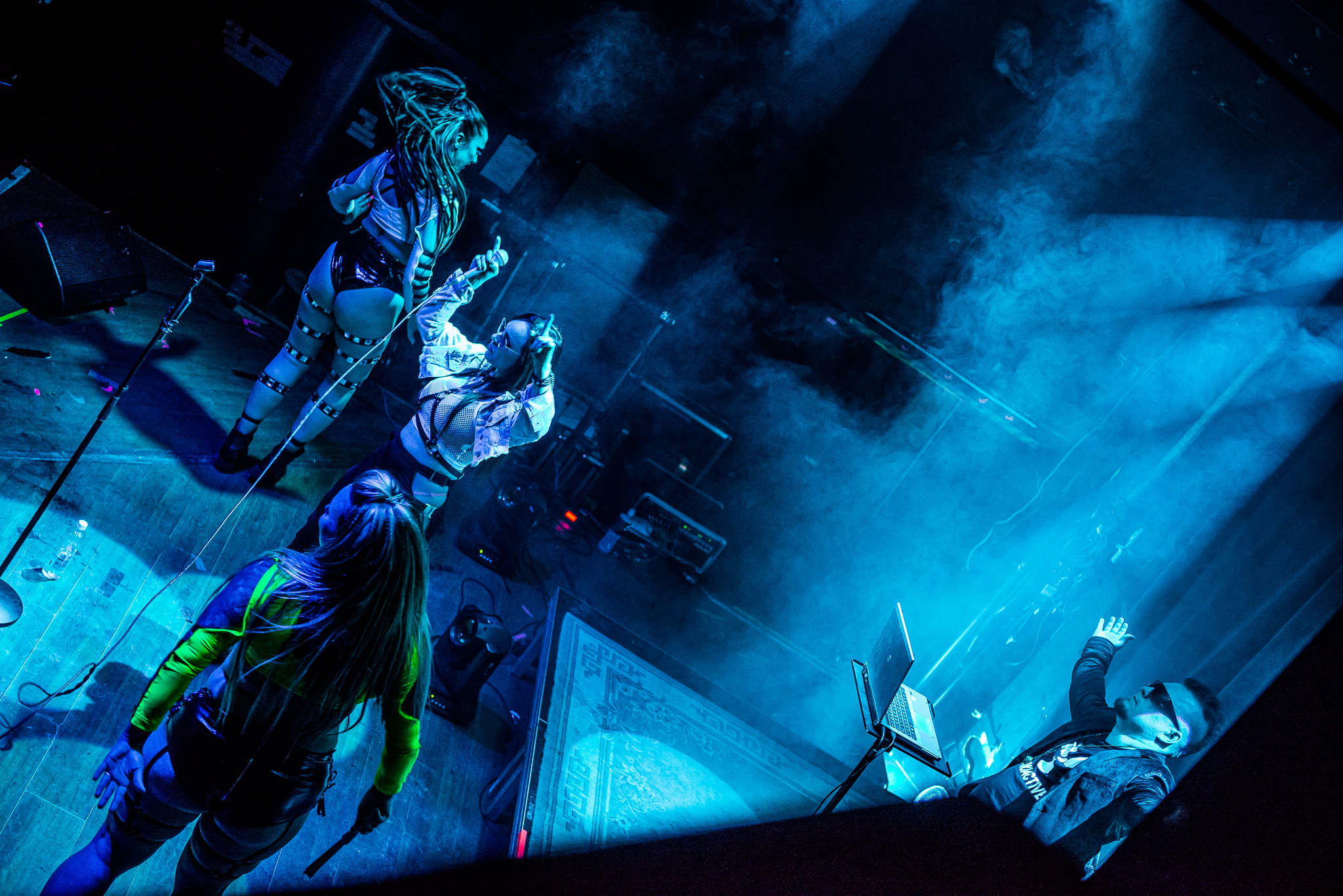 A top-angle shot by Turku's best live photographer Sami Hinkkanen. The song ends, the girls catch their breath, and Mike poses in his signature stance in the back.